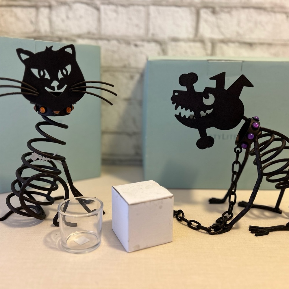 Two halloween votive holders